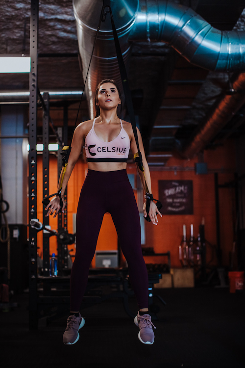 image of a woman working out in celsius apparel